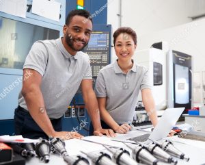 stock photo portrait of engineers using cad programming software on laptop 1067940731