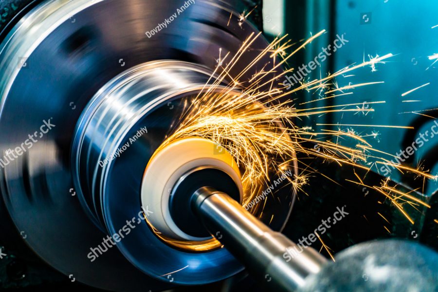 stock photo sparks fly from an abrasive stone on a grinding machine 1563432931
