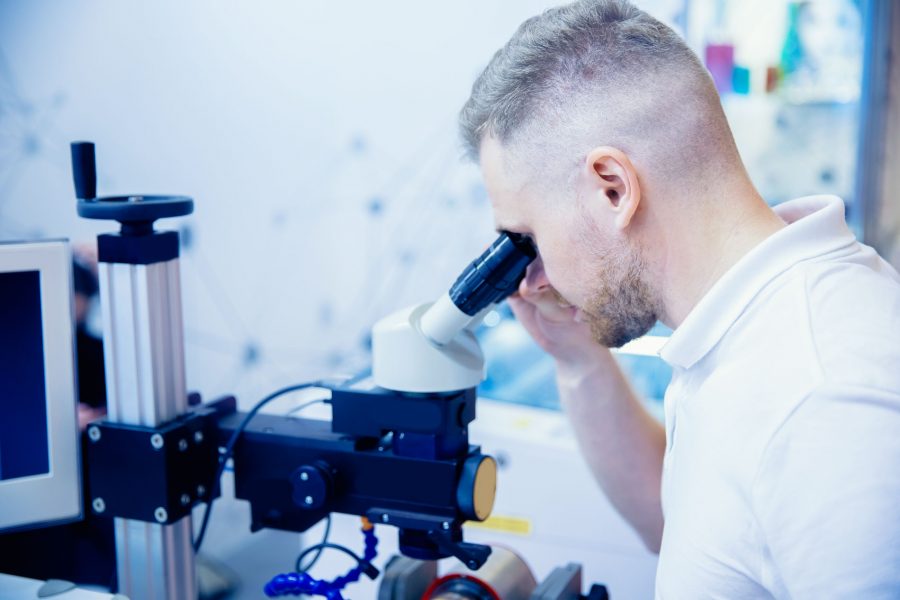 Slitting Analysis man looking at slit material 1